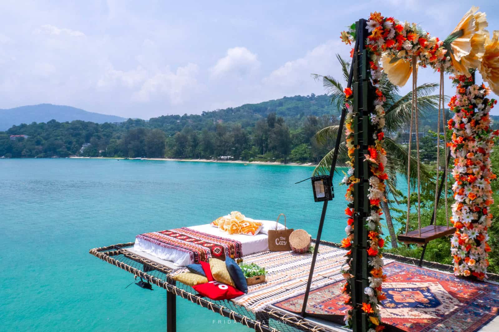 Flower-decorated platform with ocean view
